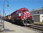 WSOR 3806 leads a colorful consist toward J-Ville